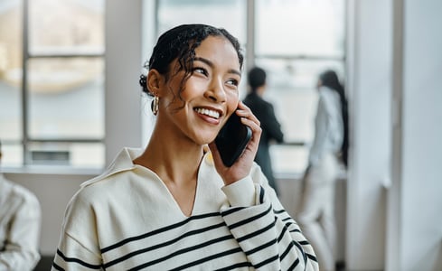 sales rep building rapport over the phone with a new prospect